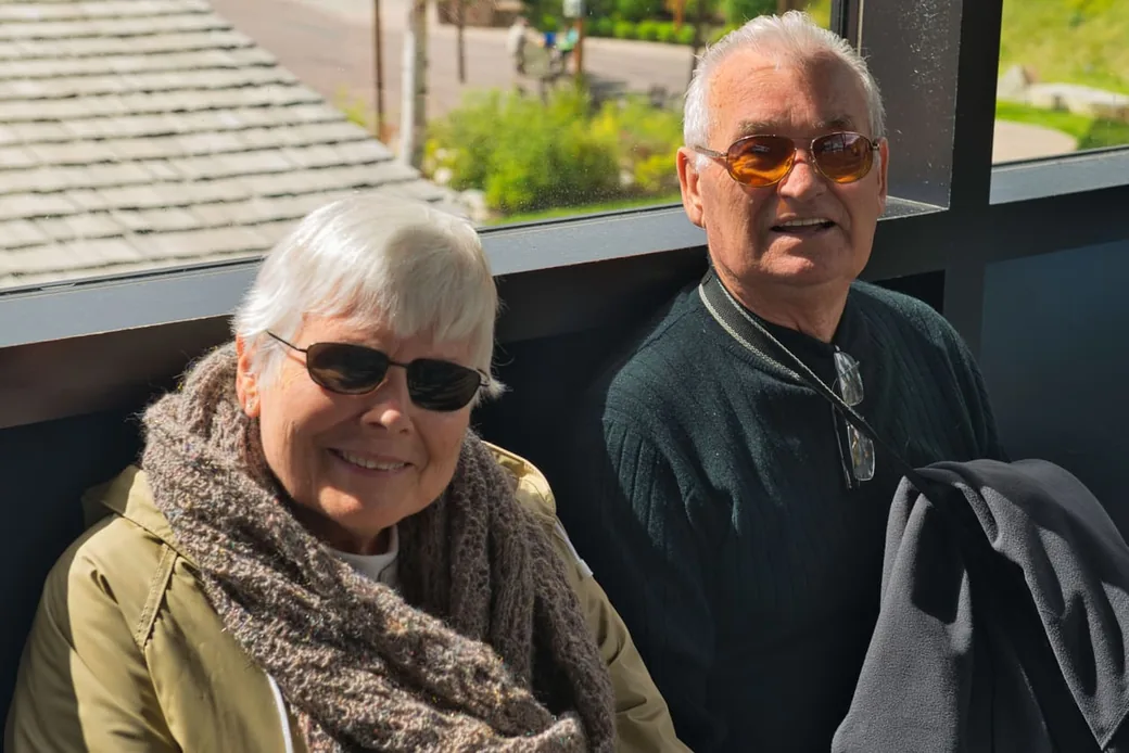 Grandparents relaxing together after qualifying for a Super Visa visit to Canada